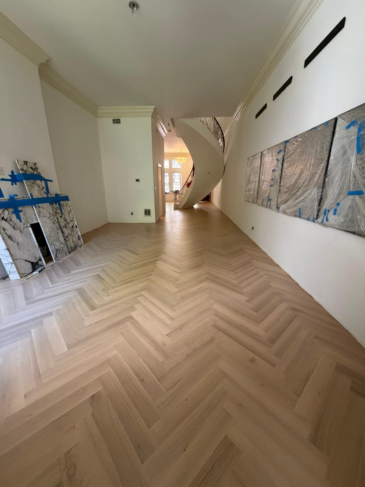 White oak herringbone through the hallway of an Upper West Side brownstone