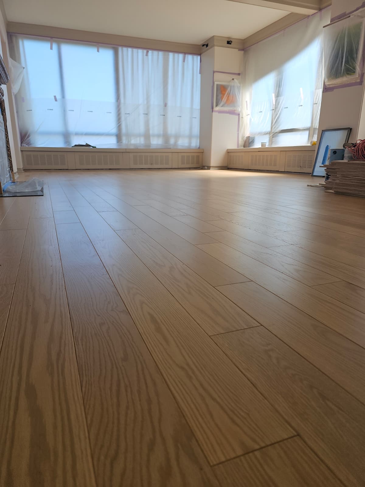 Finished prefinished engineered oak 5 inch plank floor in a Tribeca apartment