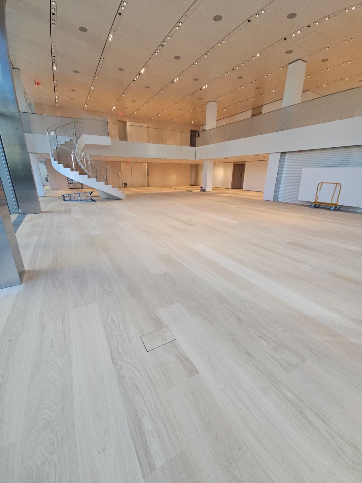 Wide plank engineered oak floors with a natural satin finish on the 8th floor of the Tiffany flagship store in Midtown West