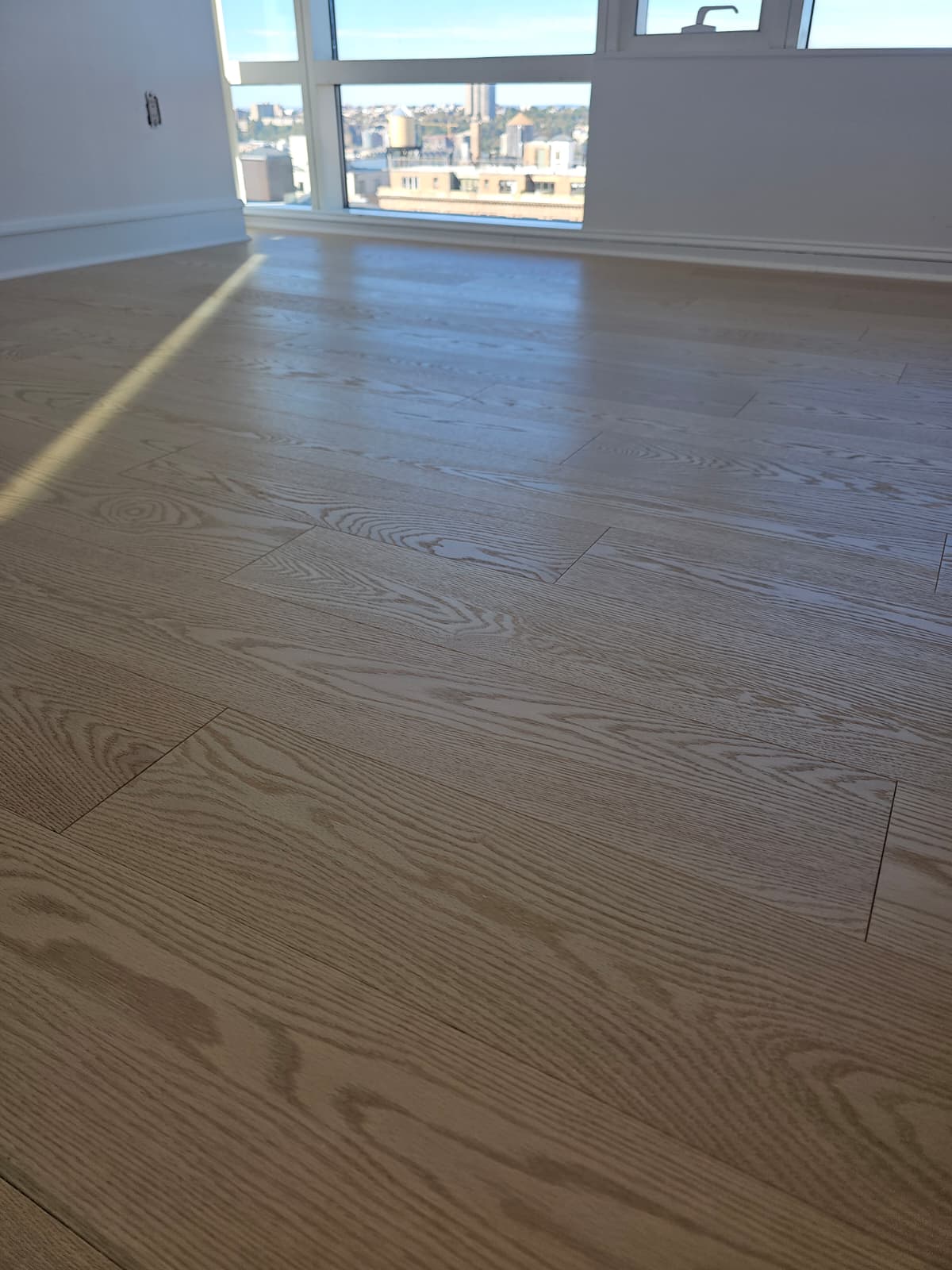 Finished wide plank oak floor in a SoHo apartment